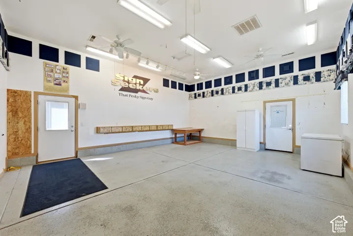 Fully permitted 500+ sq ft flex space.  Attached to the garage with double doors, to the house basement by a single door, and to the side parking area by a single door.