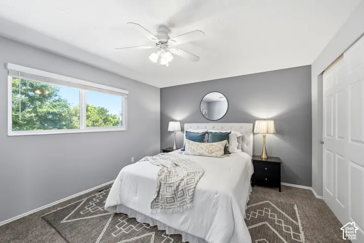 Primary bedroom with attached bathroom and ample natural light.