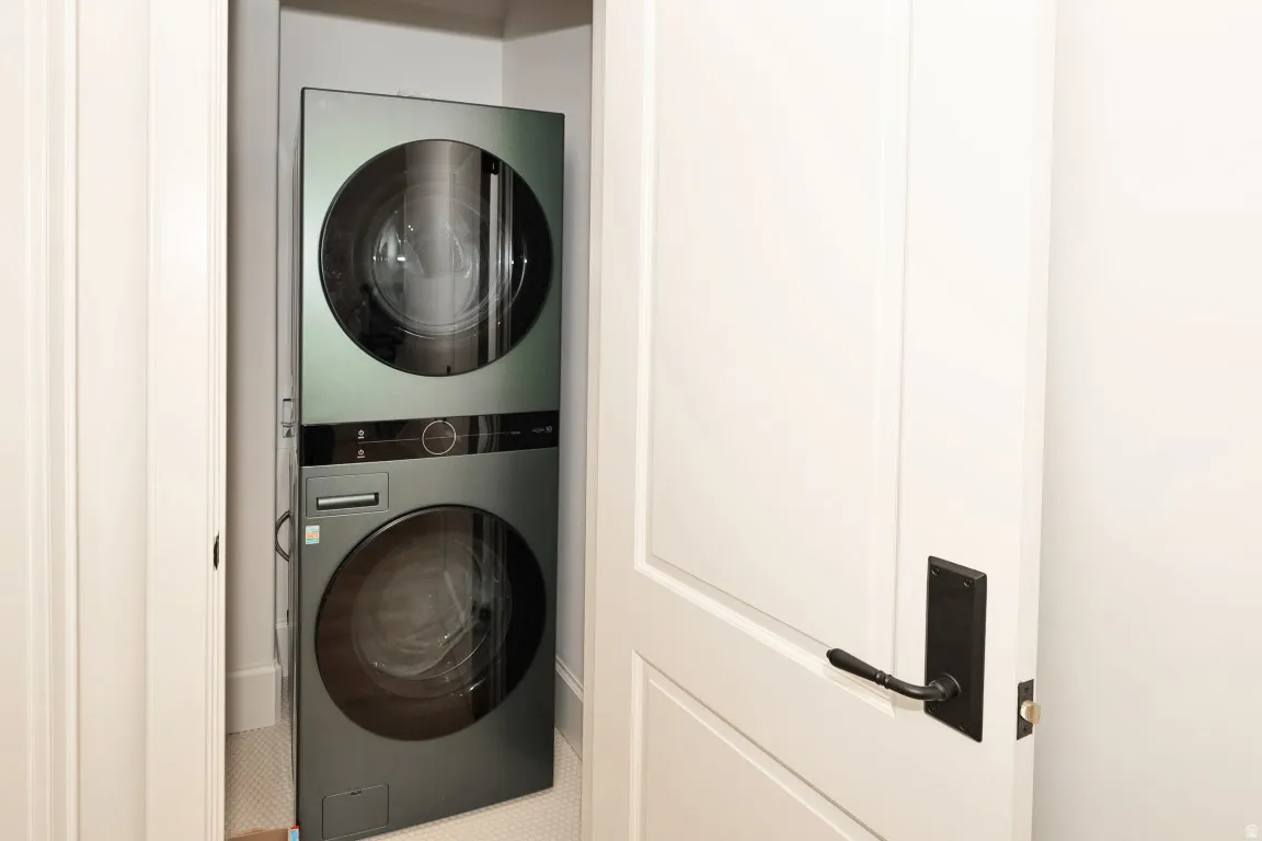Stackable laundry appliances within a dedicated closet
