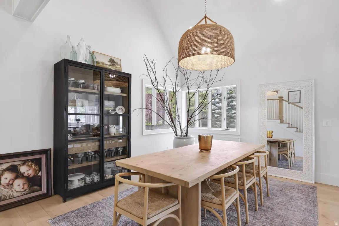 Vaulted ceiling with an oversized woven pendant fixture