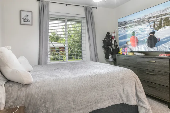 Window with horizontal blinds and drapery panels