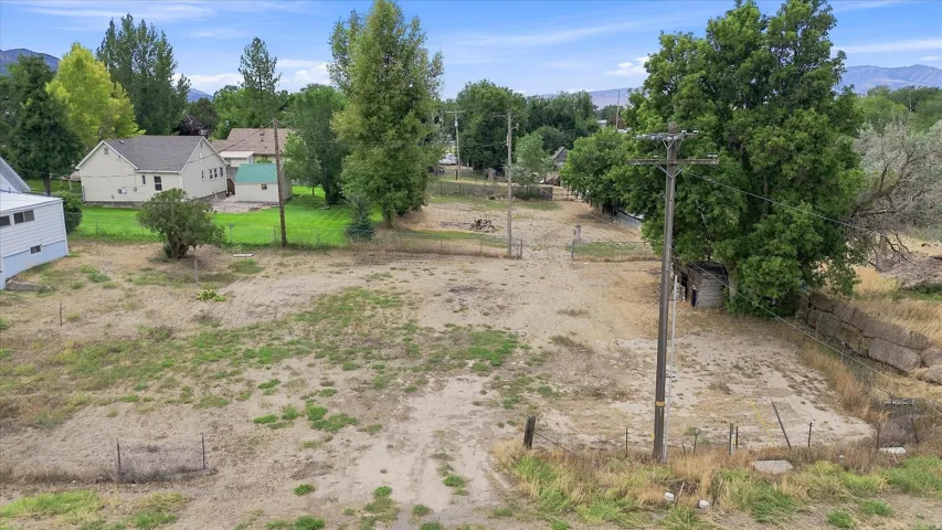 Expansive open lot with distant mountain range