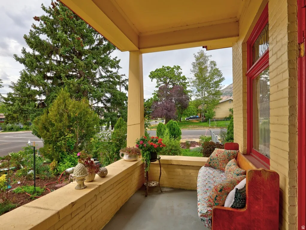 Additional covered porch with entrance to living room