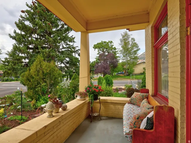 Additional covered porch with entrance to living room