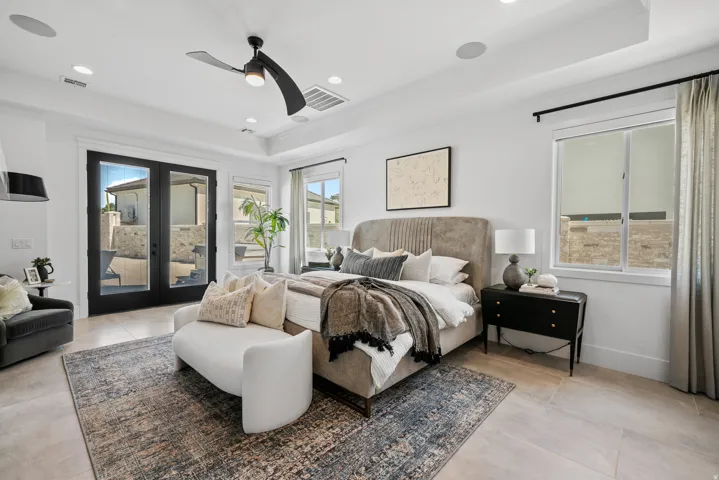 Tray ceiling with recessed lighting, ceiling fan, and in-ceiling speakers