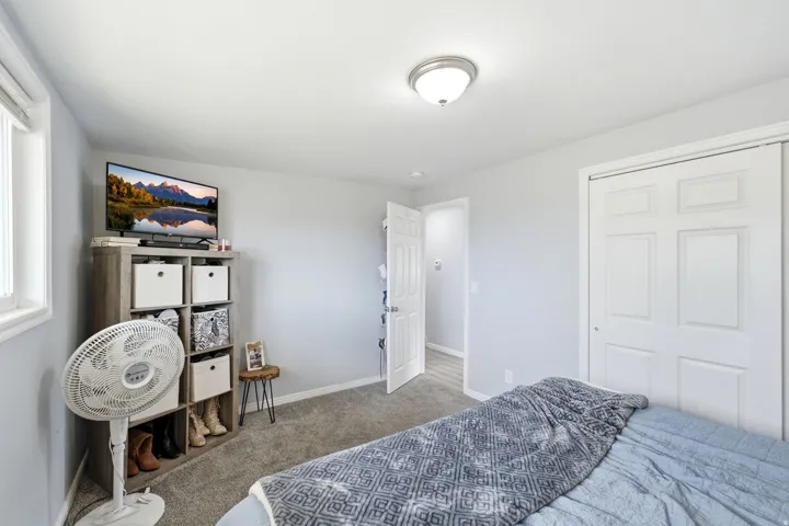 Soft gray wall paint and matching carpet