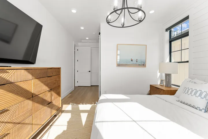 Wood-finish flooring complemented by recessed lighting