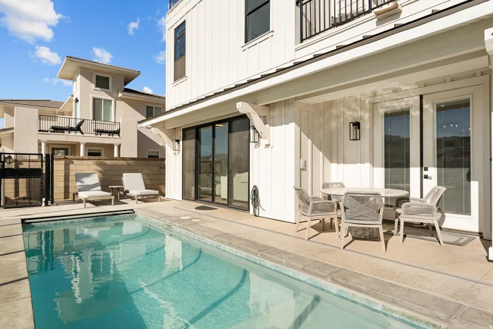Private swimming pool with concrete decking