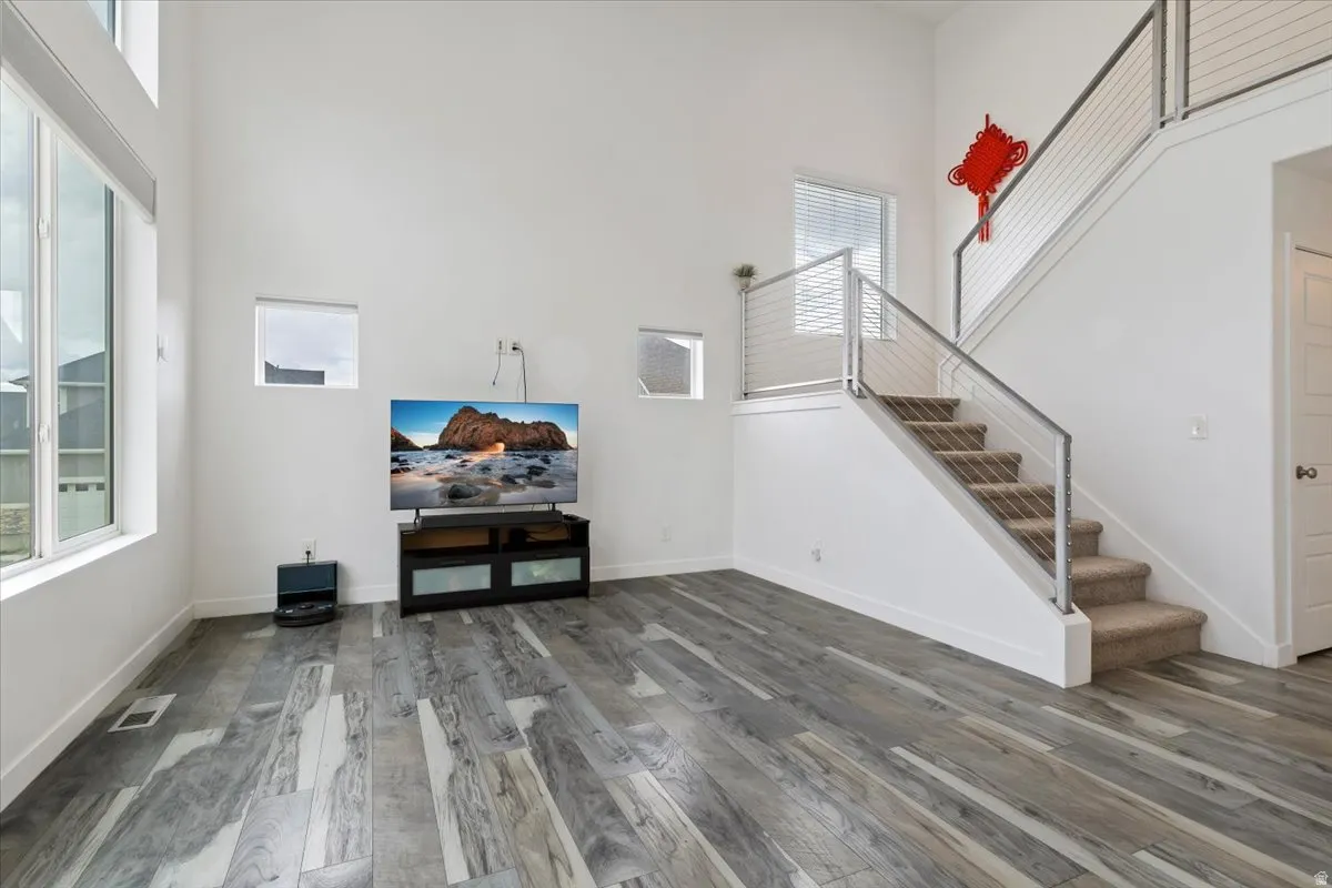 High ceilings with abundant natural light from multiple windows