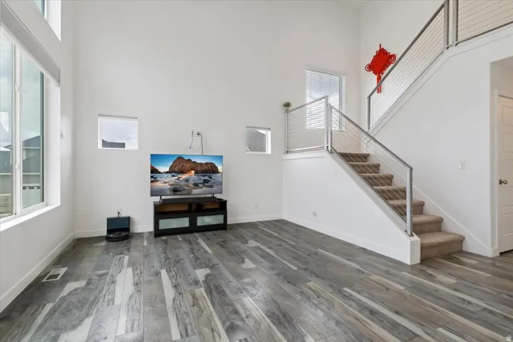 High ceilings with abundant natural light from multiple windows