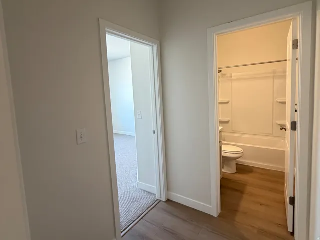 Main level bedroom & full bath off garage entrance