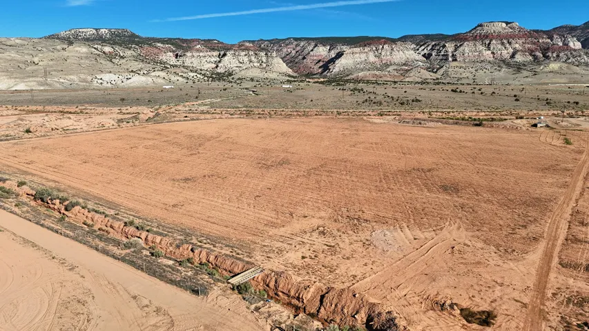 Expansive graded land with a clear, level surface