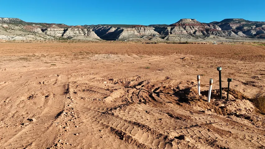 Graded lot with visible utility connections