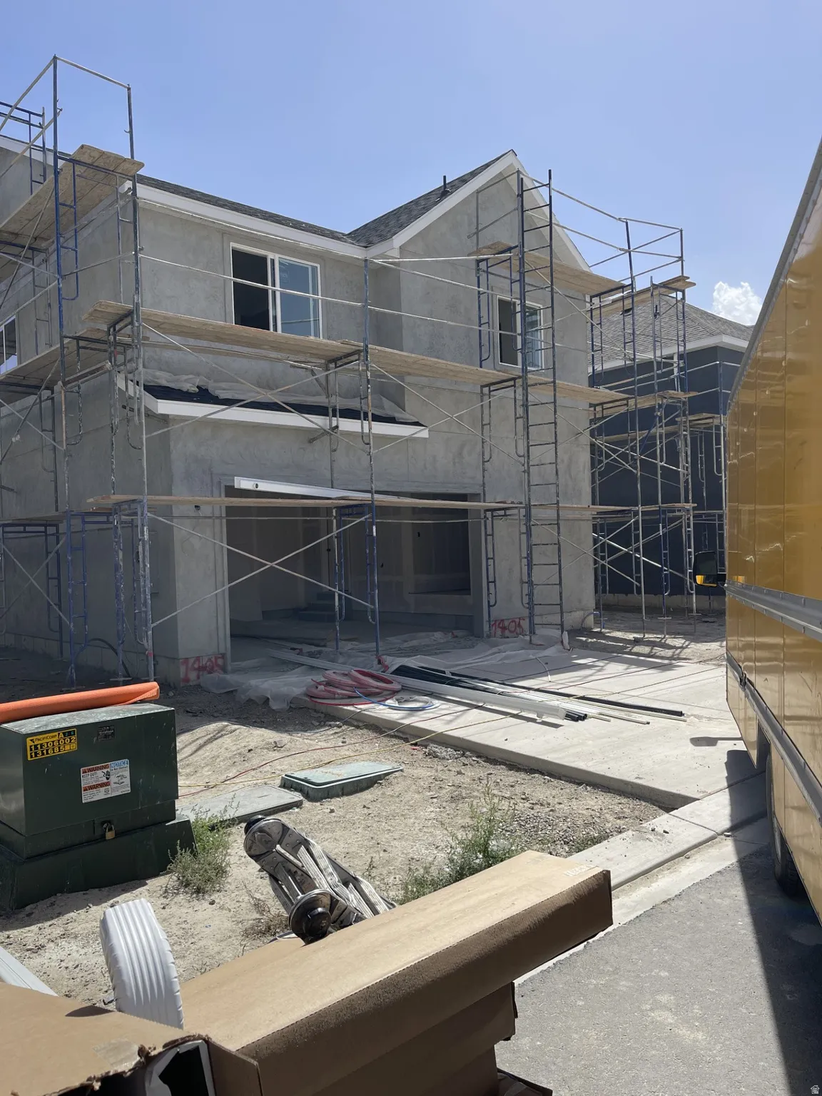 Rear view of Garnett Elevation C with landscaping to be installed.