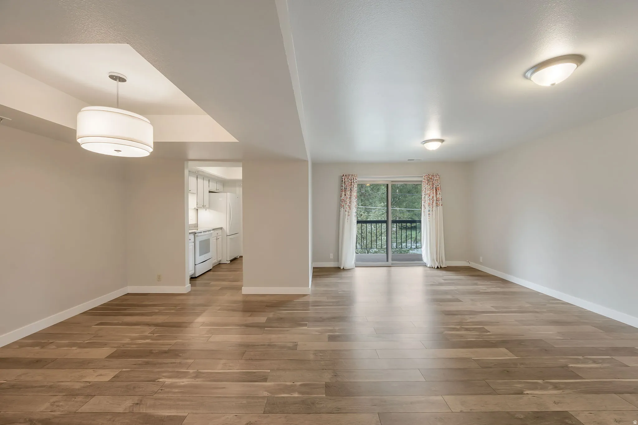 Laminate wood floors. Open floor plan.