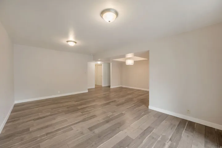 Laminate wood floors. Open floor plan.