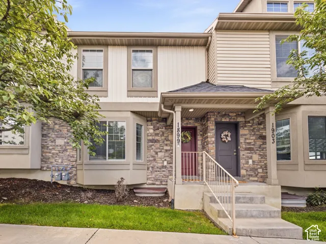 Stone veneer accent walls and siding exterior