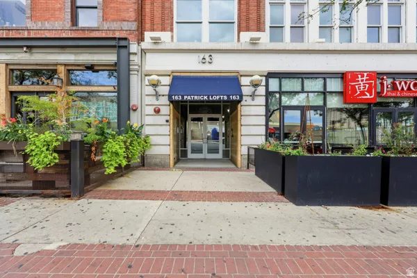 Brick facade building with large street-level windows