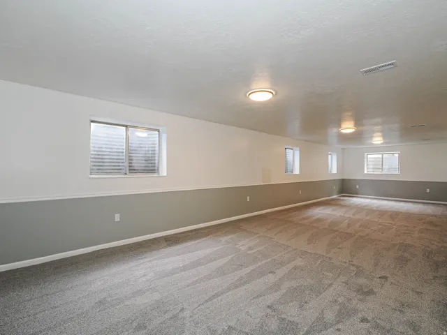 large spacious basement living room.