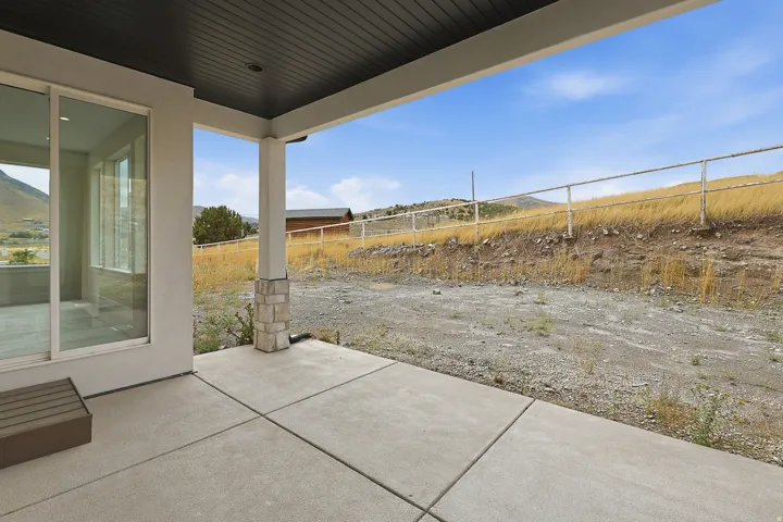 Covered patio featuring a concrete surface