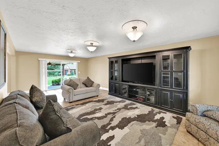 Built-in media center with glass-front cabinetry