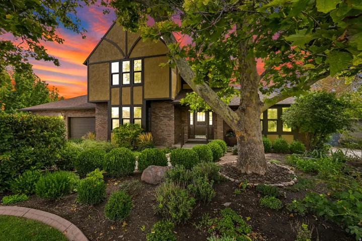 Tudor-style architecture featuring brick and stucco siding