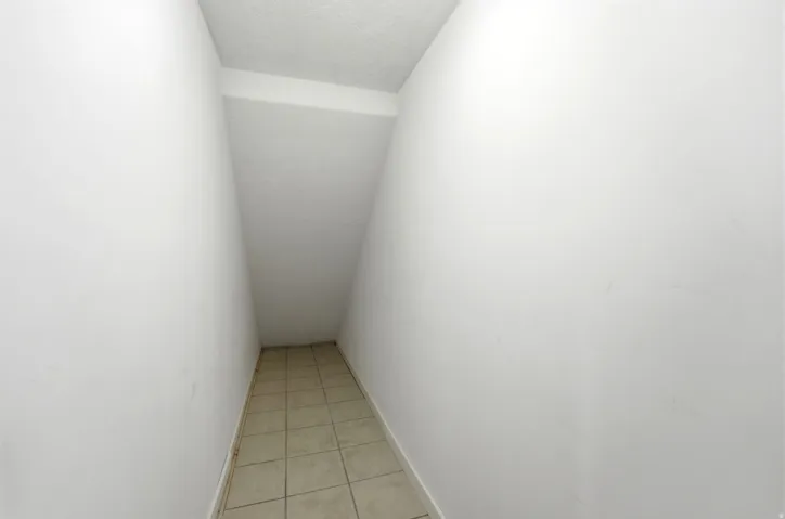 Storage area with tile flooring