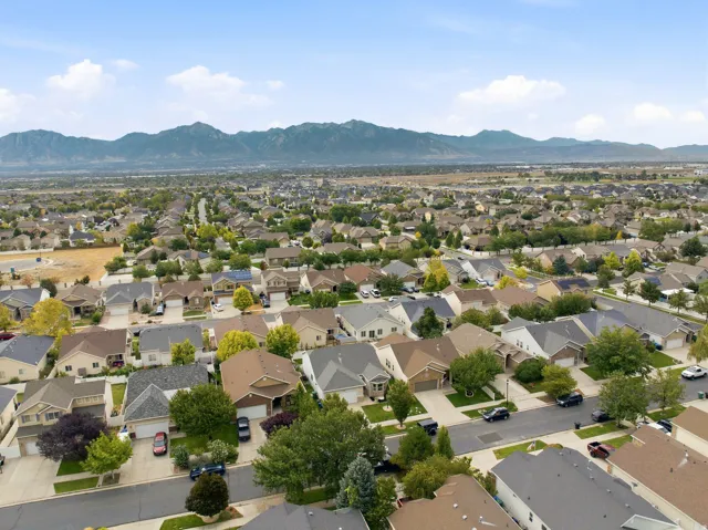 Residential neighborhood with a backdrop of distant mountains
