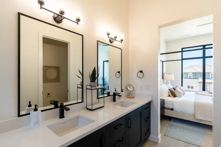 Dual vanity with undermount sinks and matte black hardware