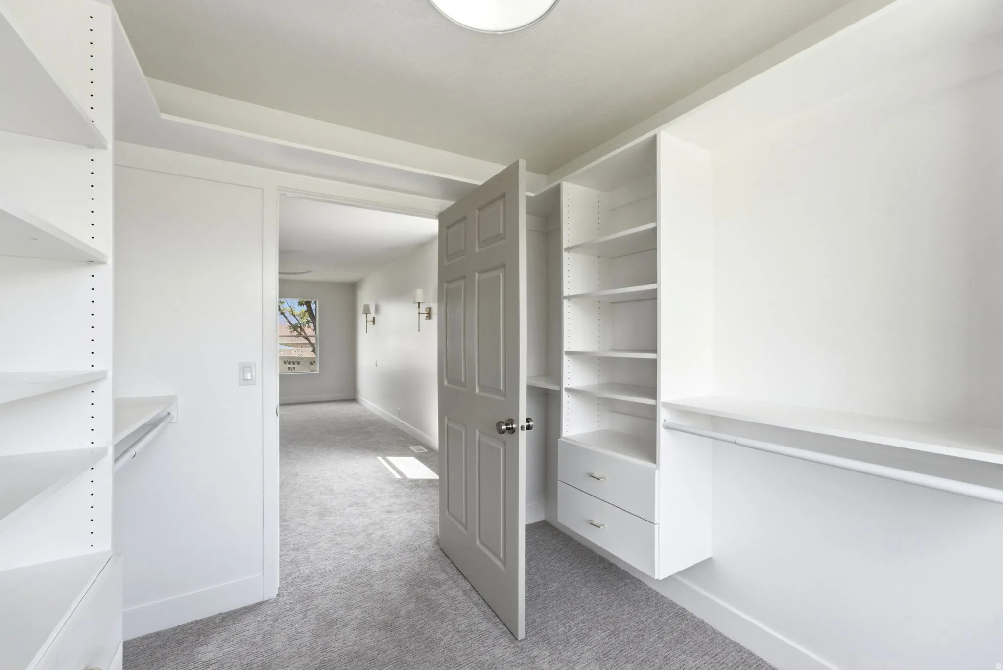 Built-in shelving, integrated drawers, and ample hanging space