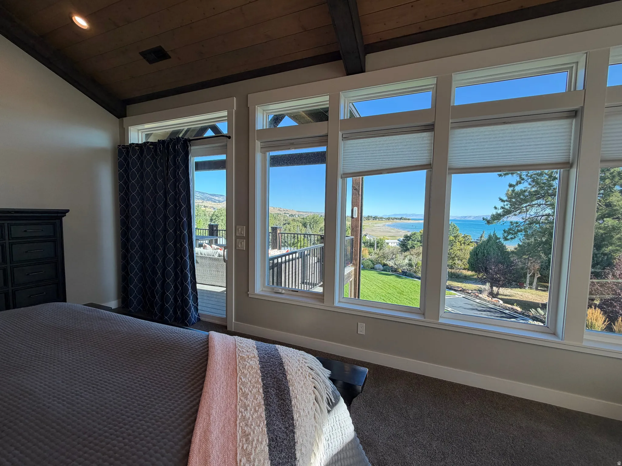 Vaulted wood-paneled ceiling with exposed beams