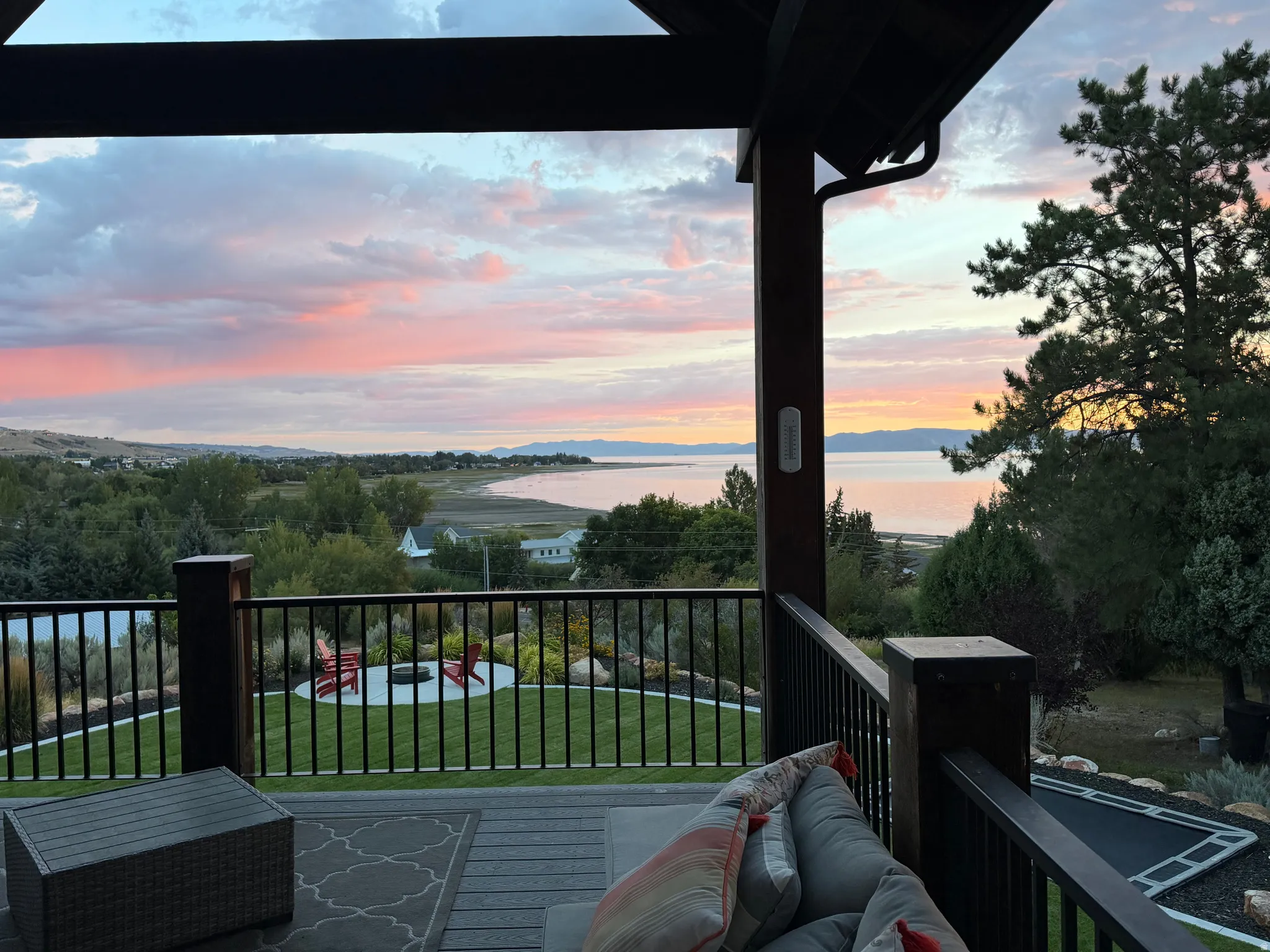 Expansive outdoor deck with a dark railing system