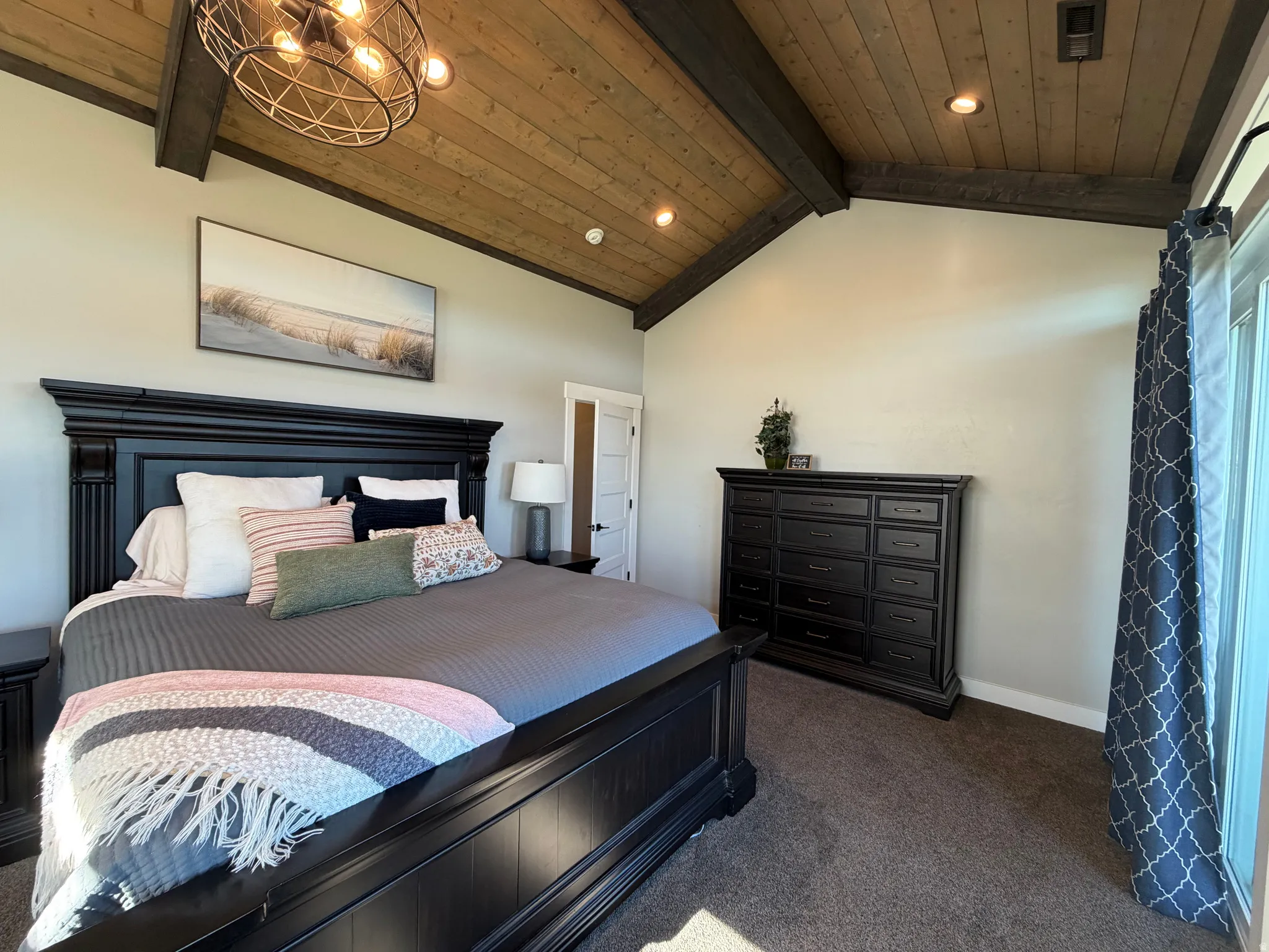 Vaulted wood-paneled ceiling with exposed beams