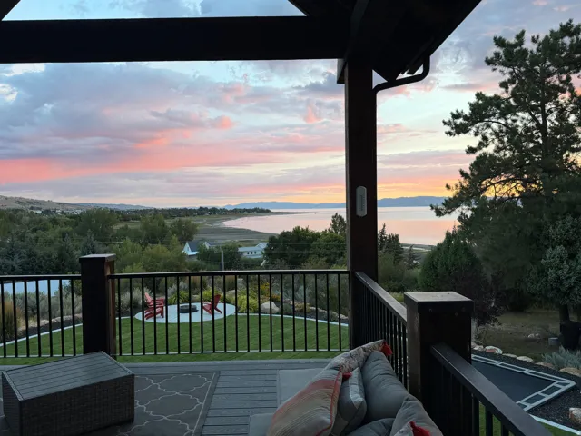 Expansive outdoor deck with a dark railing system