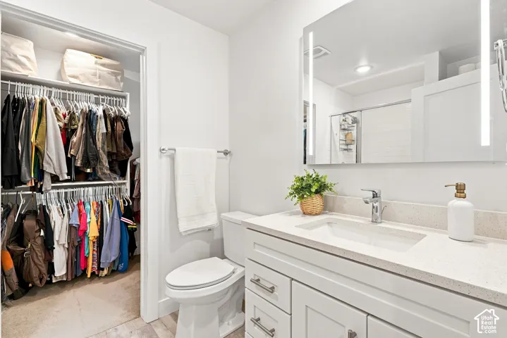 Primary Bathroom and Walk-in Closet