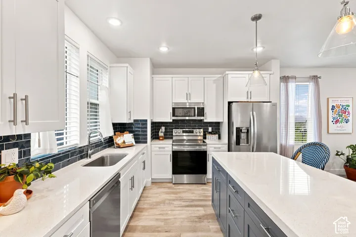 Crisp White Cabinets with Stainless Appliances