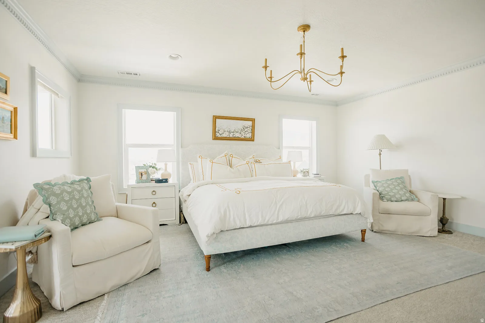 Gold-finish chandelier illuminating the space