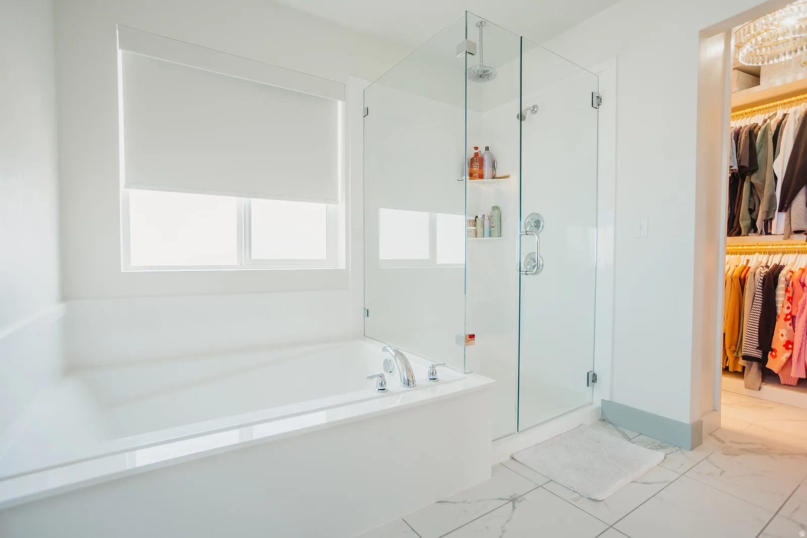 Soaking tub with deck-mounted chrome fixtures