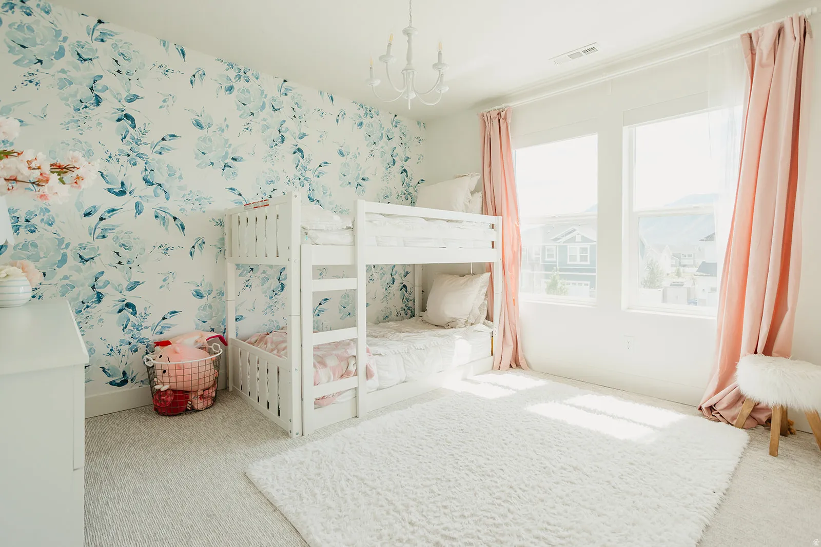 Light-toned wall-to-wall carpeting throughout