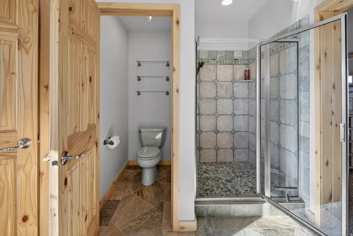 Pine wood-finish doors with chrome hardware