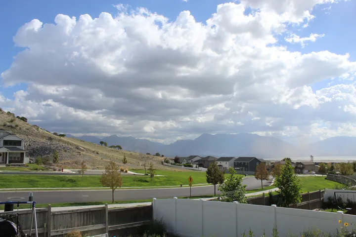 Mountain scenery and distant water features complement the neighborhood setting