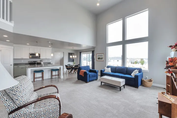 Expansive great room with soaring ceilings and large-format windows