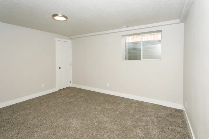 Neutral wall tones with a textured ceiling finish