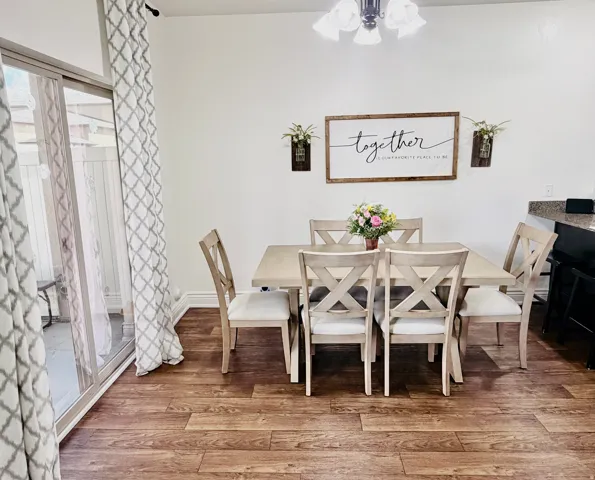 Wood-finish flooring throughout the dining area