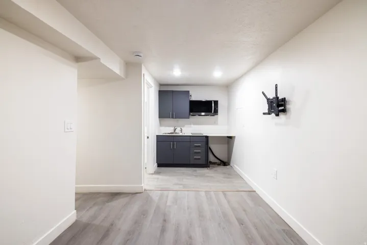 Wood-finish flooring throughout the main area