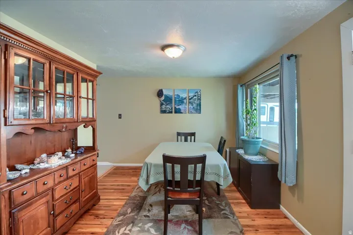Warm-toned walls complement wood-finish flooring