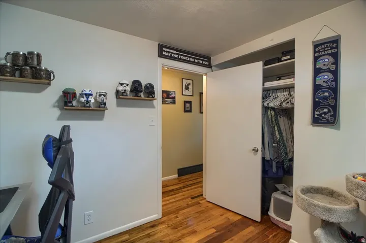Light-colored walls with wood-finish flooring