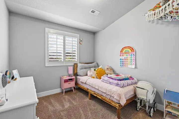 White window shutters frame the natural light