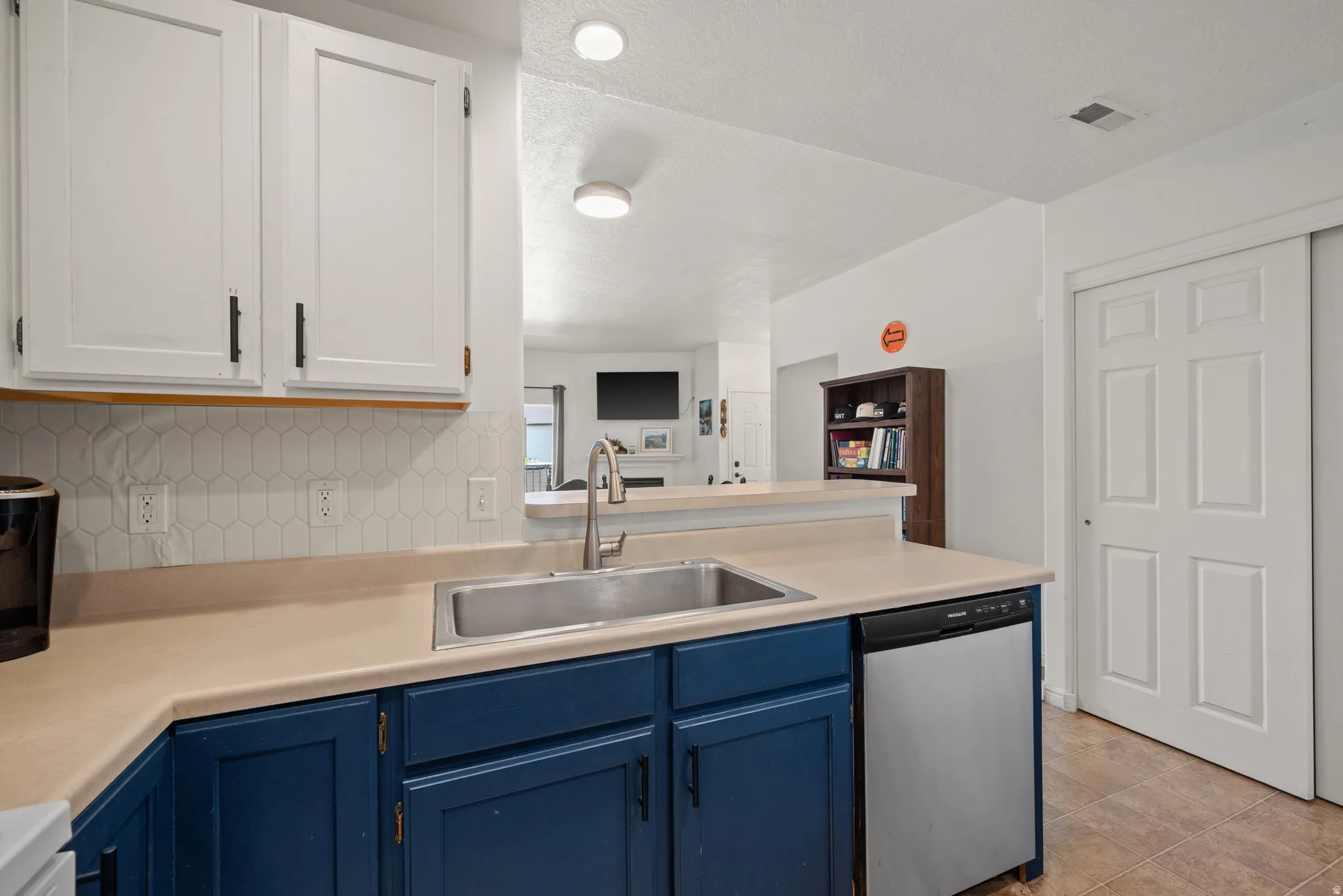 Stainless steel sink with a gooseneck faucet