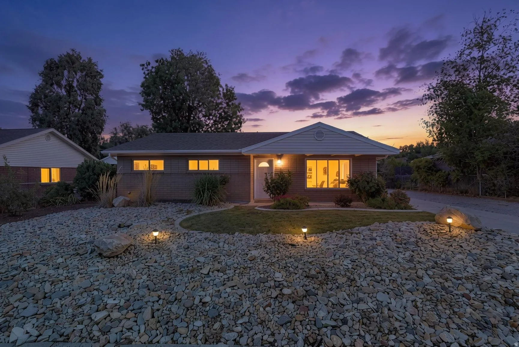 Brick exterior with light-colored siding accents